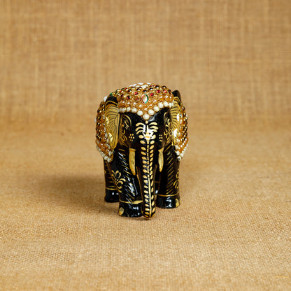 Wooden Elephant with stones